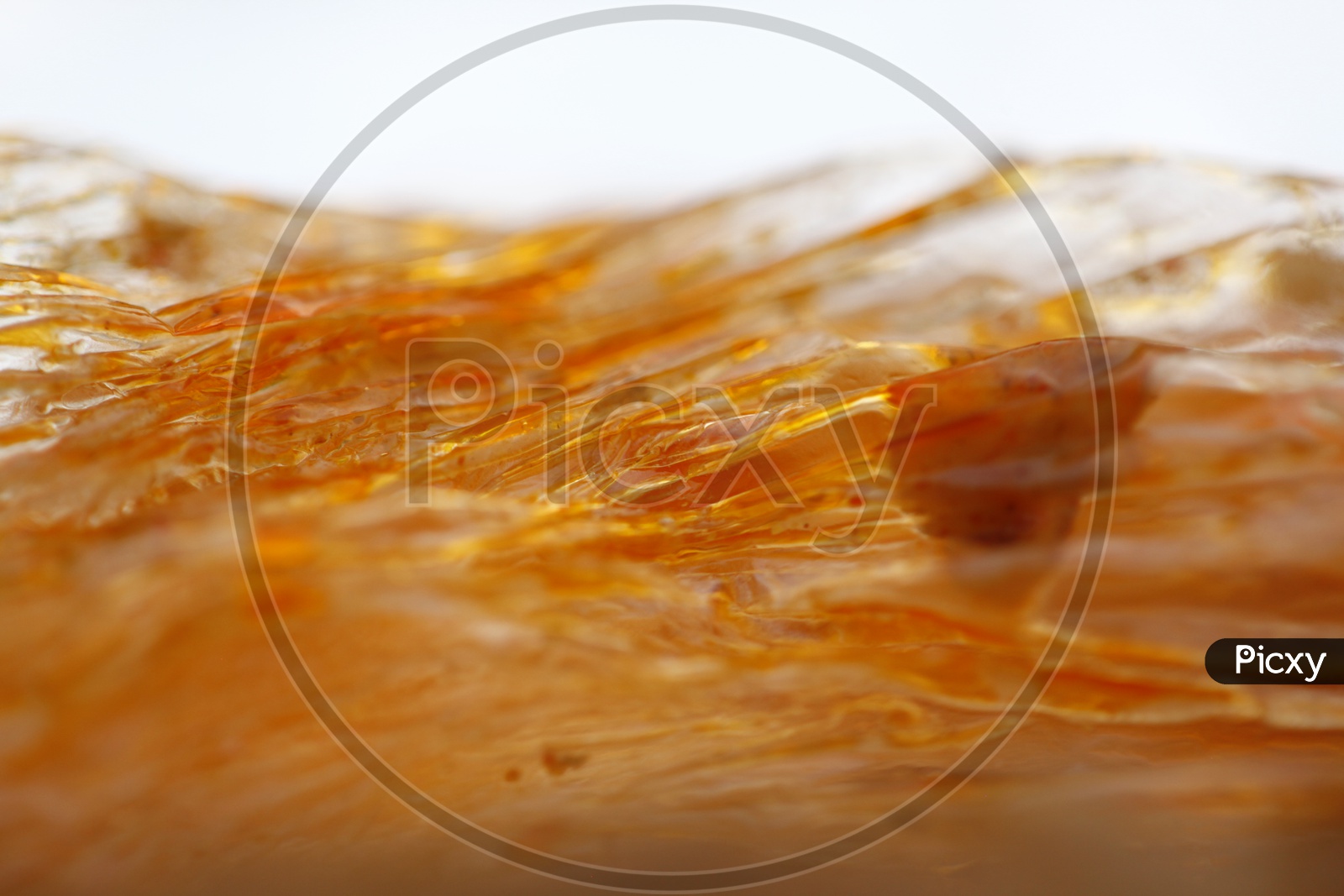 Image Of Macro Of Curry Oil In A Polythene Cover AH075838 Picxy