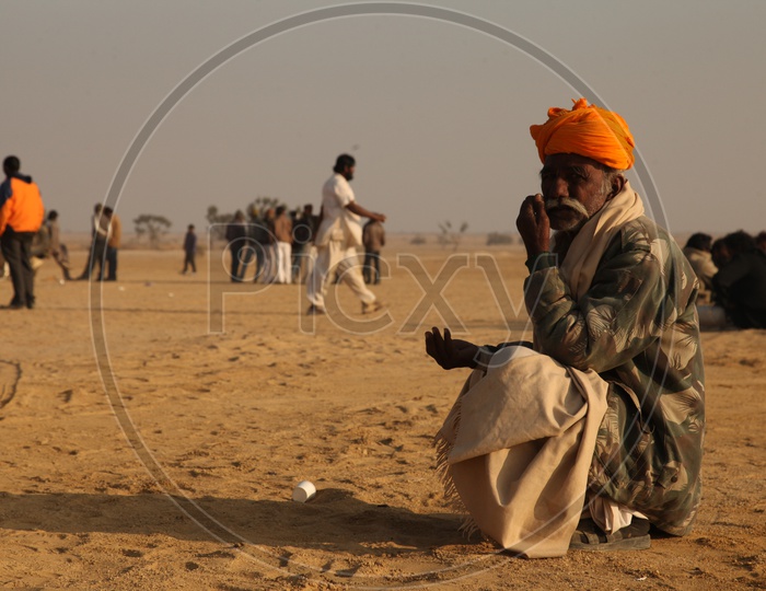 Indian Old Man in a Desert
