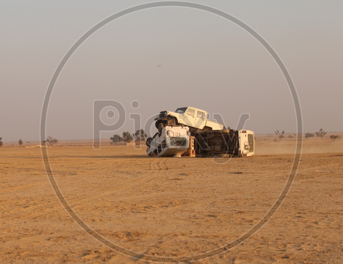 Vehicles crash in the desert