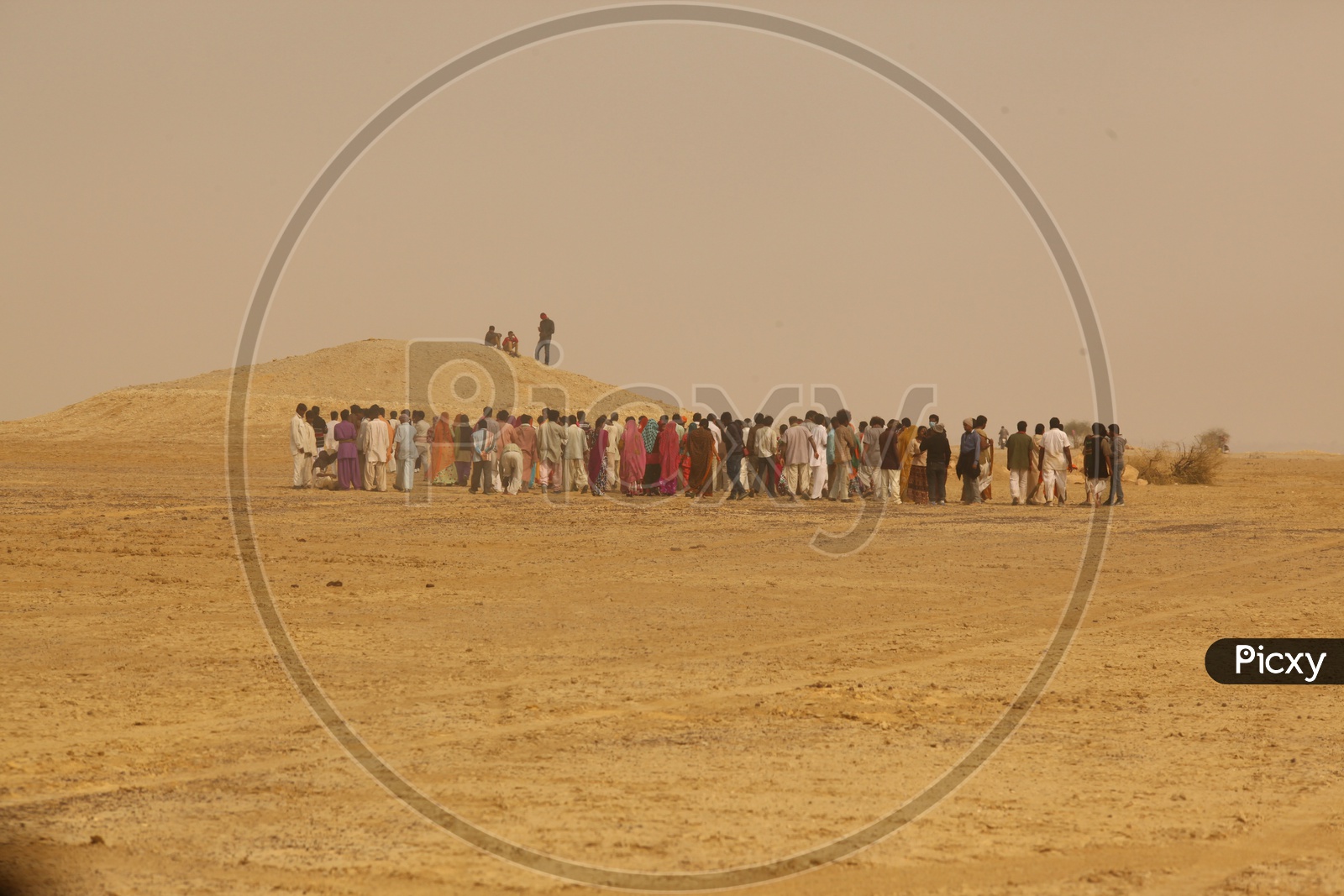 People walking in desert
