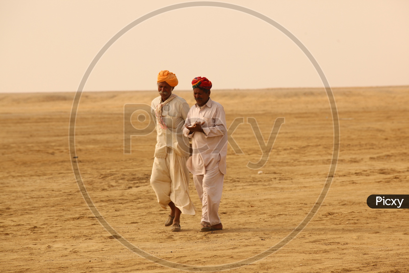 People walking in desert