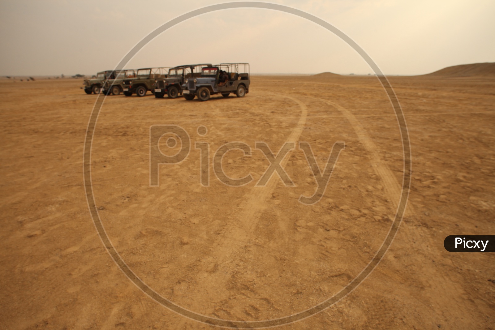 Vehicles parked in desert