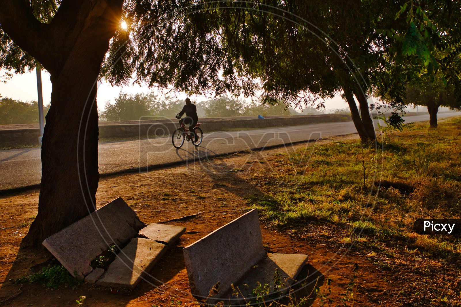 Person riding a bicycle early morning