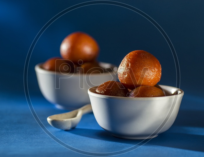 Indian Dessert or Sweet Dish Gulab Jamun in a Bowl