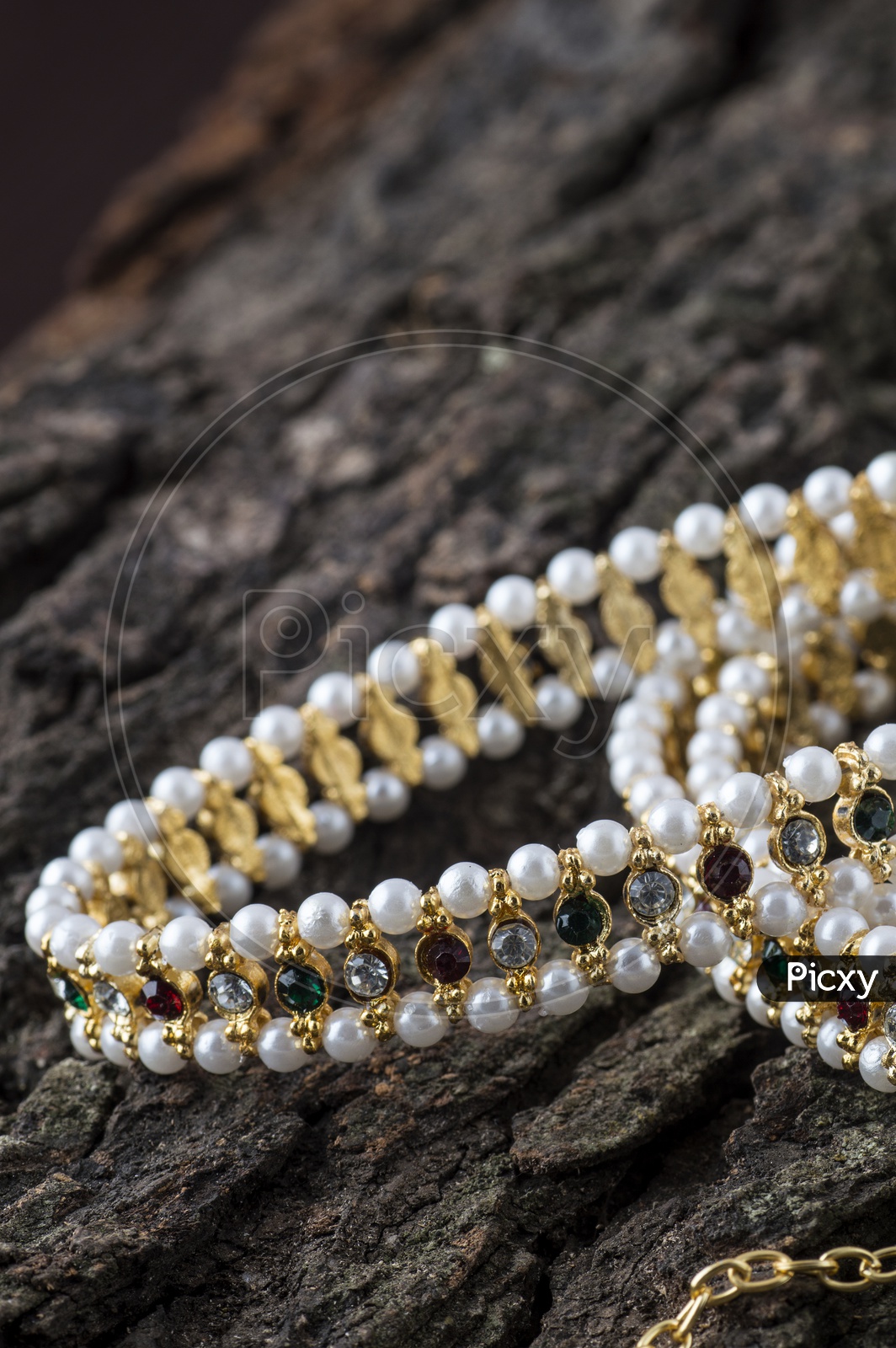 Pearl chain with multi color stones