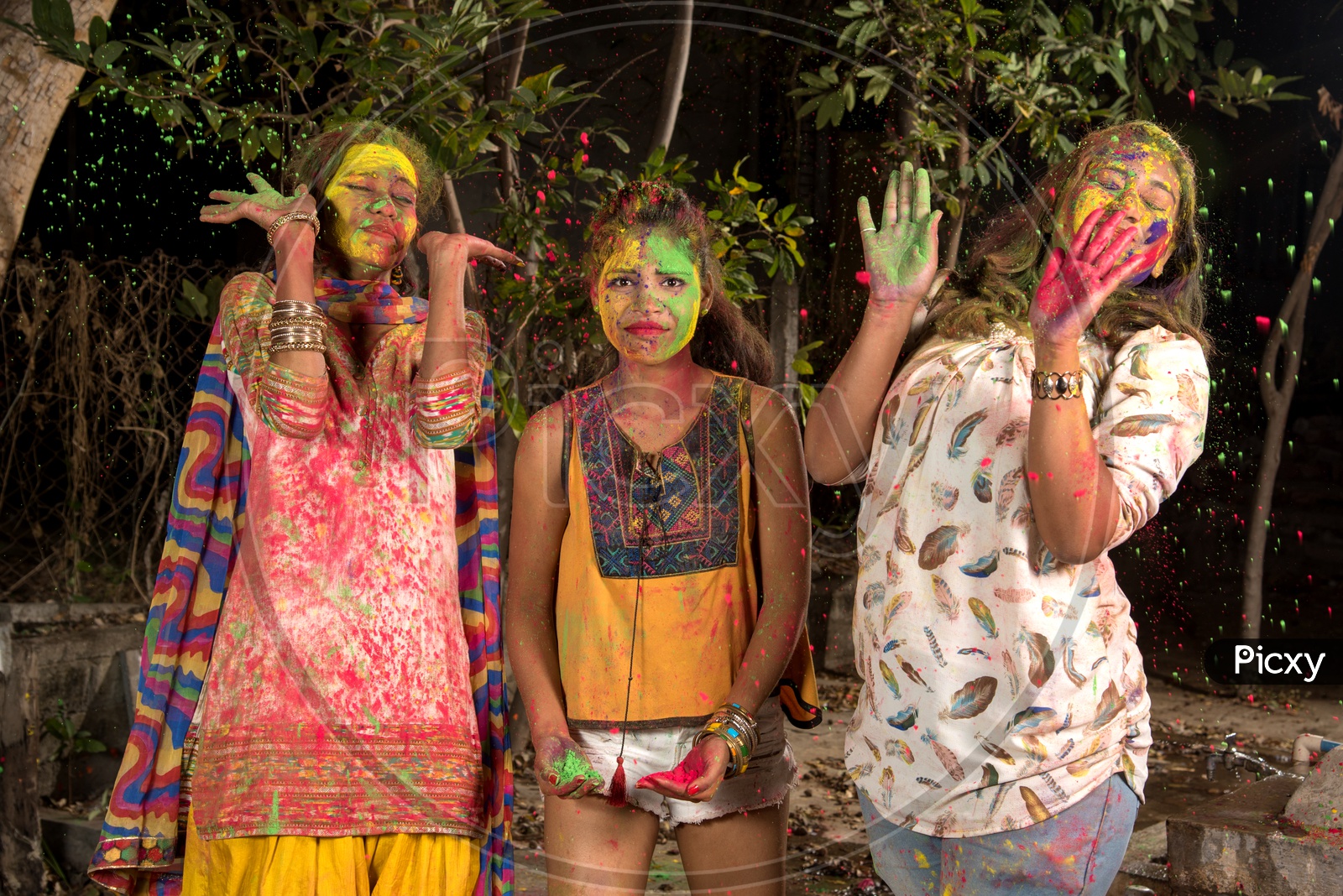A Group Of Young Girls Celebrating Holi With Colour Splash