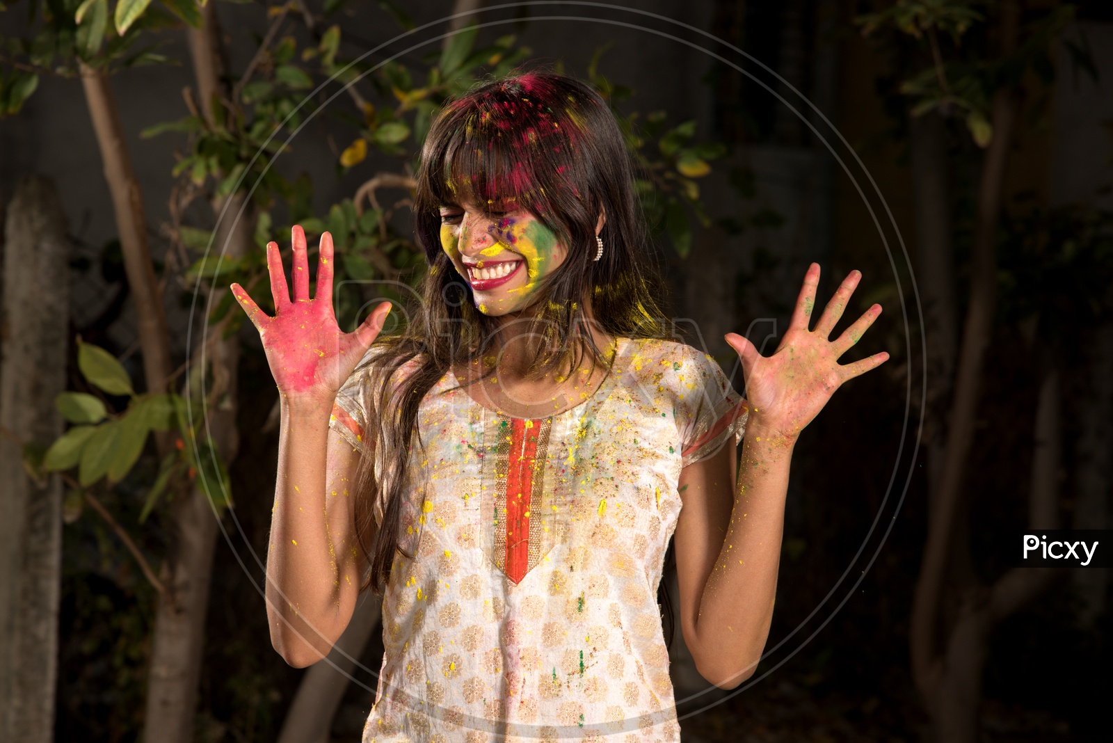 A Happy Young Indian Girl Having Fun On the Occasion Of Holi, Festival Of Colors