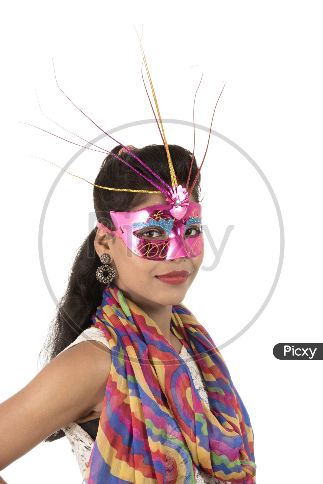 An Young Indian Girl Wearing Carnival Mask with Smiling Face