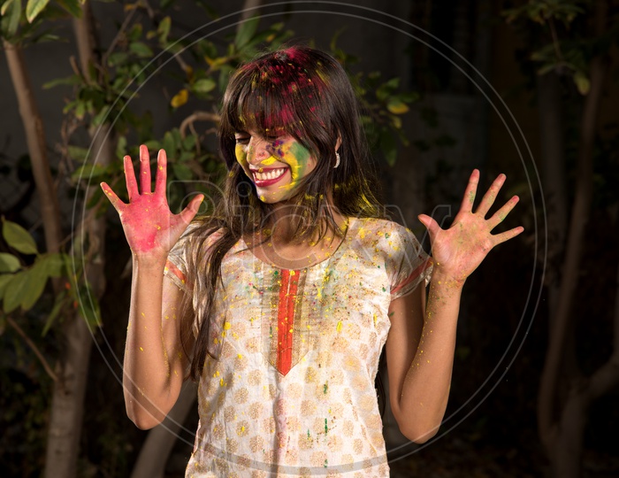 A Happy Young Indian Girl Having Fun On the Occasion Of Holi, Festival Of Colors