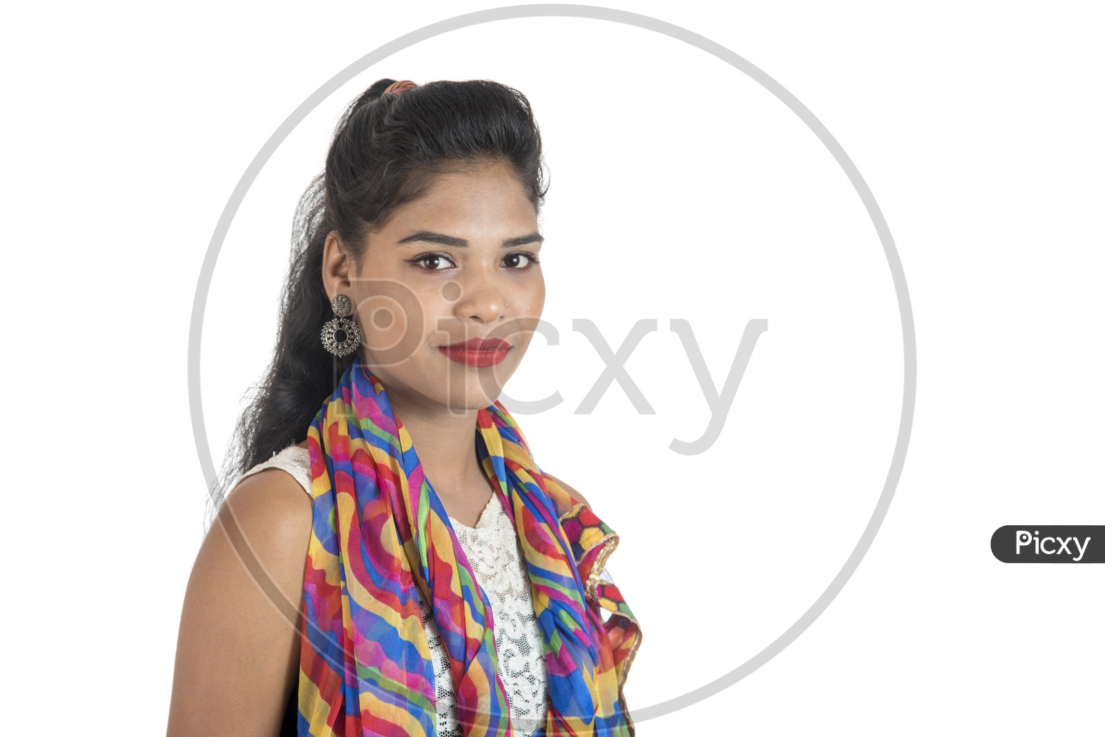 A Happy Young Indian Girl With Smiling Face Over a White Background