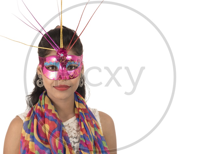 Young Indian Girl Wearing Carnival Mask With  Smiling Face