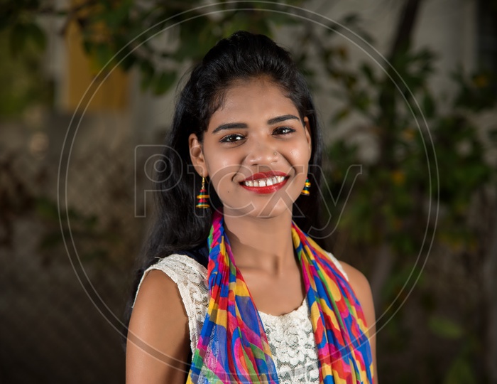 Young Indian Girl With a Smile On Her Face