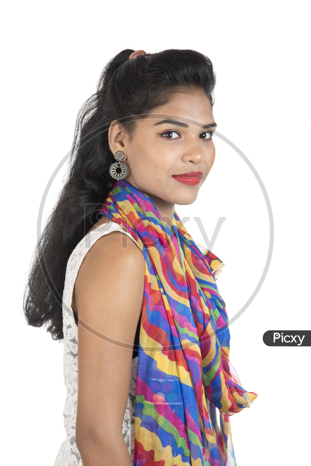 A Happy Young Indian Girl With A Smiling Face over a White Background