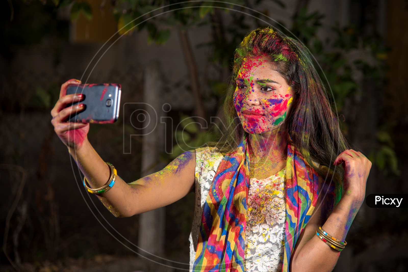Three Indian teenage girls takes selfie during Holi Color festival, Stock  Photo, Picture And Low Budget Royalty Free Image. Pic. ESY-037767396 |  agefotostock