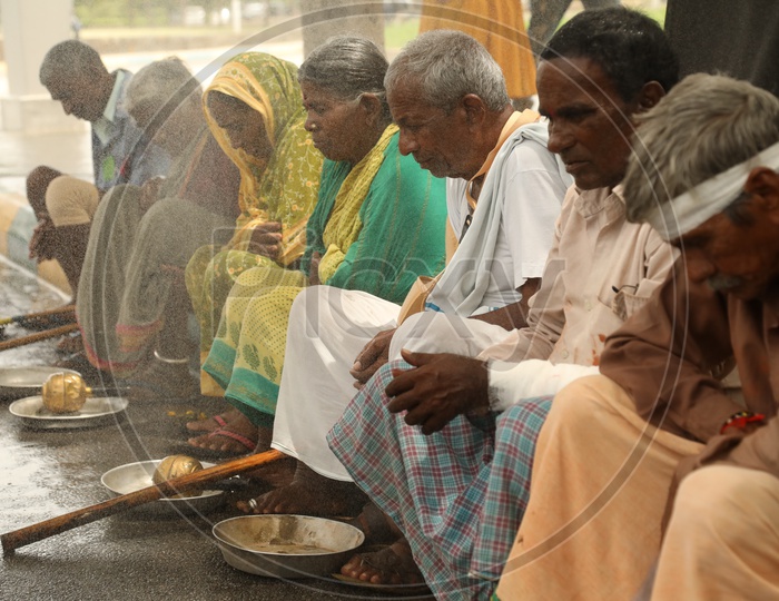 Beggars Sitting On Road Side