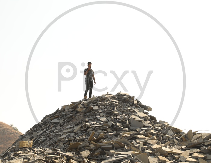 A man on the top of the Black stone mining area