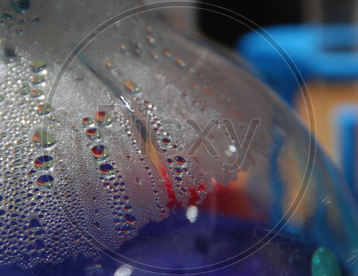 Water droplets inside a glass bottle