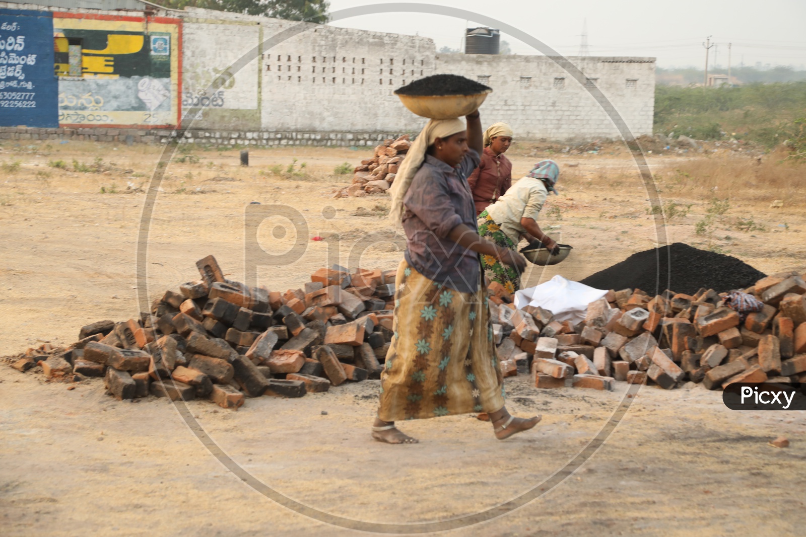 Women working at a local brick factory