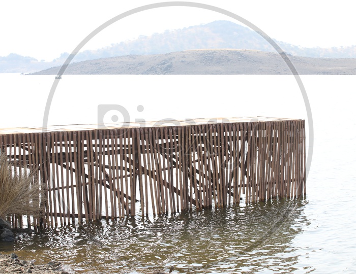 A Wooden Pier Constructed On a Lake