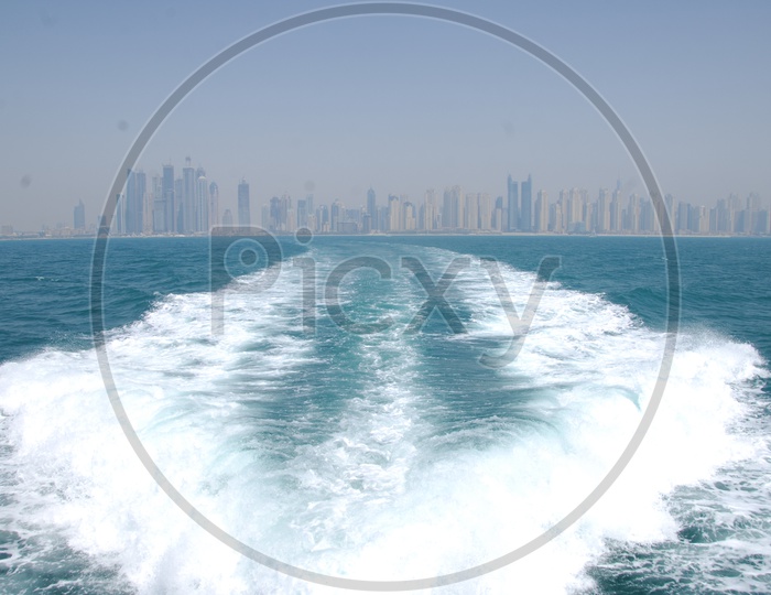 Image of Water Ripples Formed by Speed Boat Propellers-US658965-Picxy