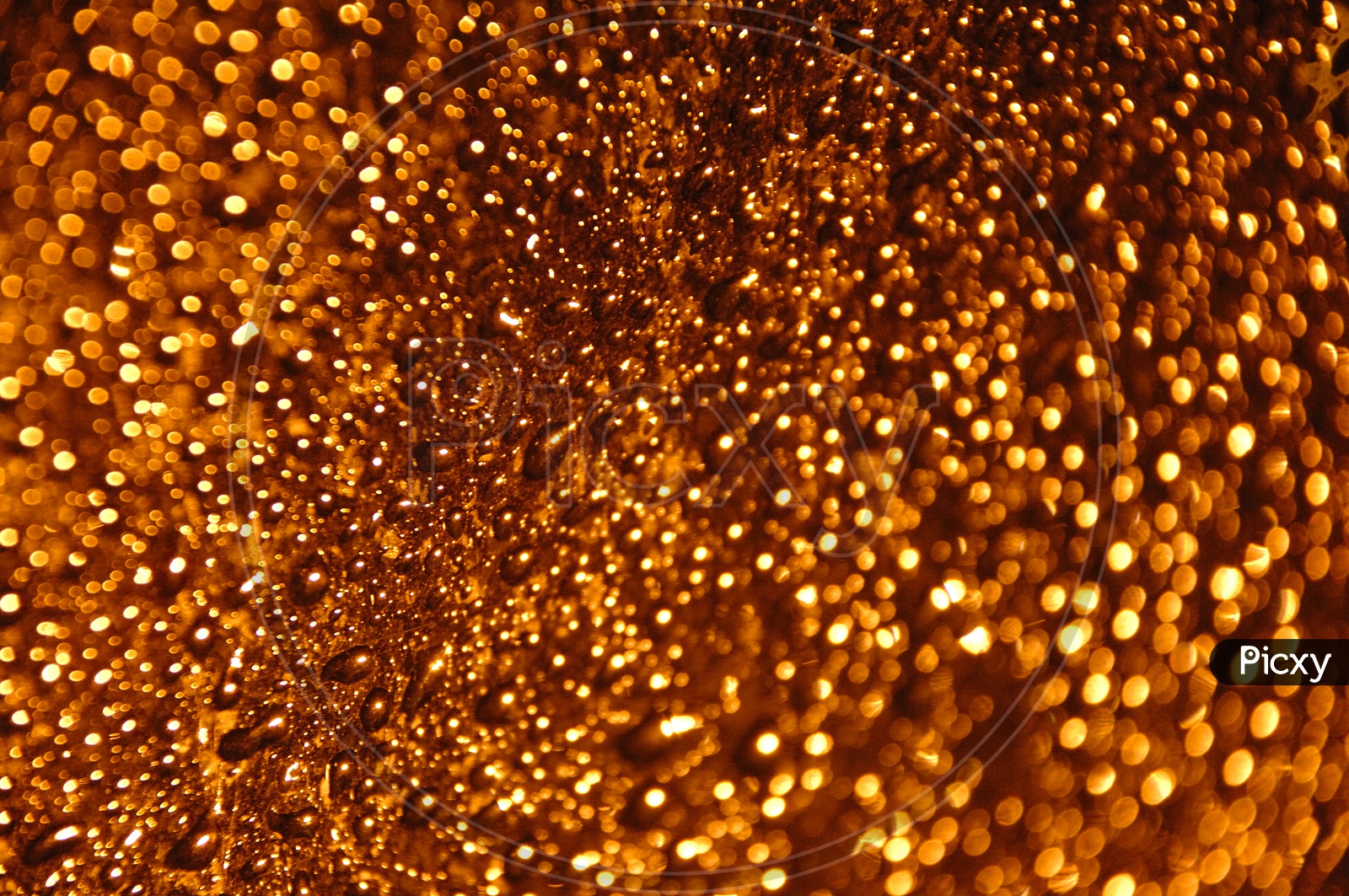 Water droplets gold abstract background