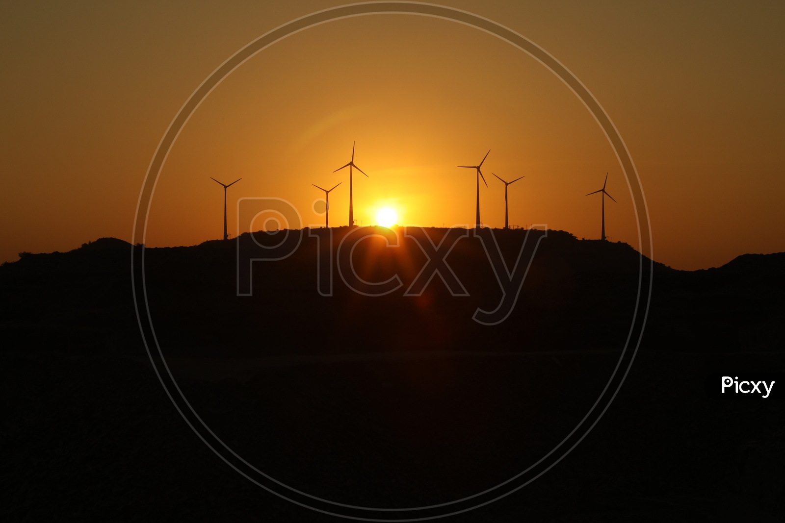 Windmills during sunset