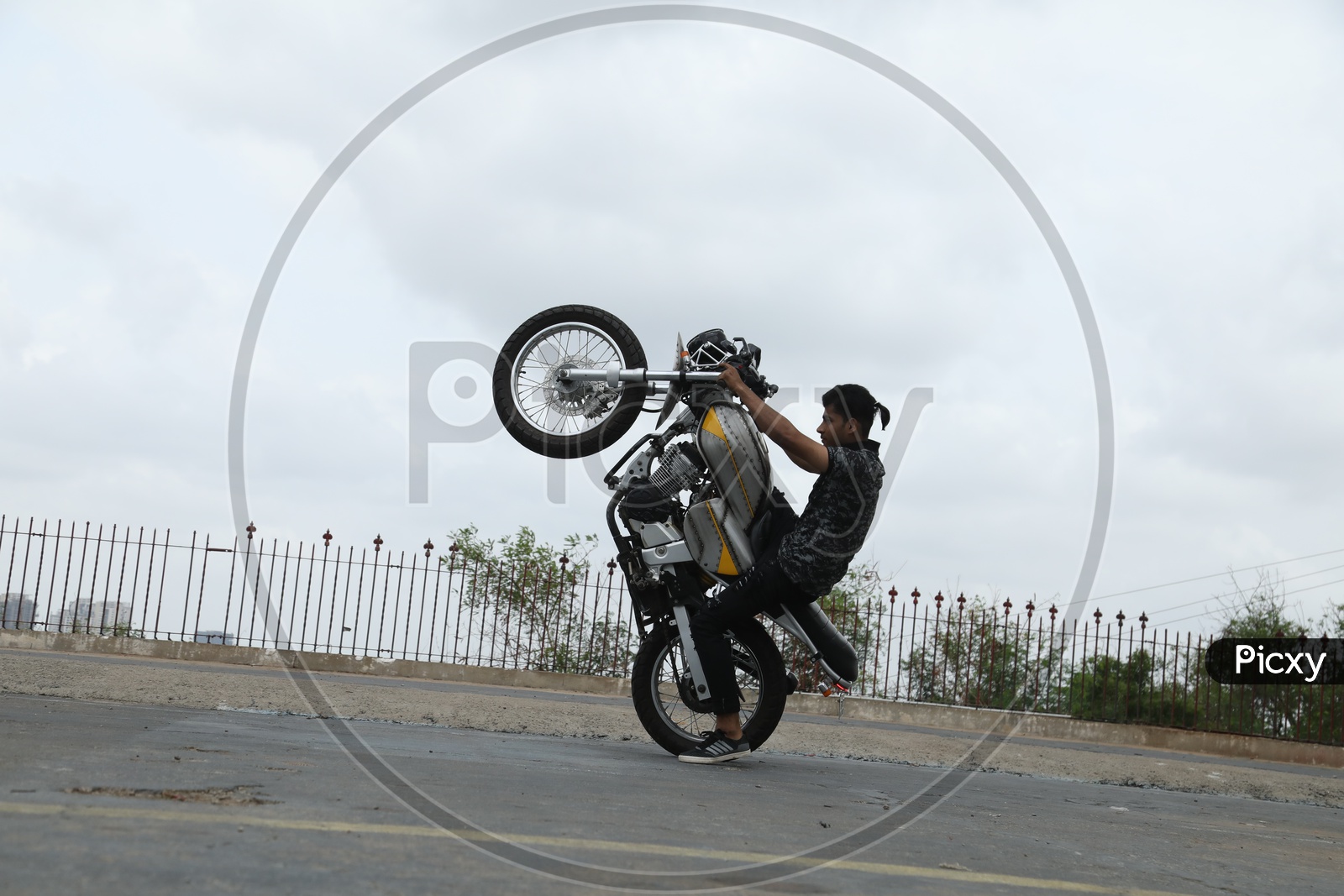 Biker Performing Stunts