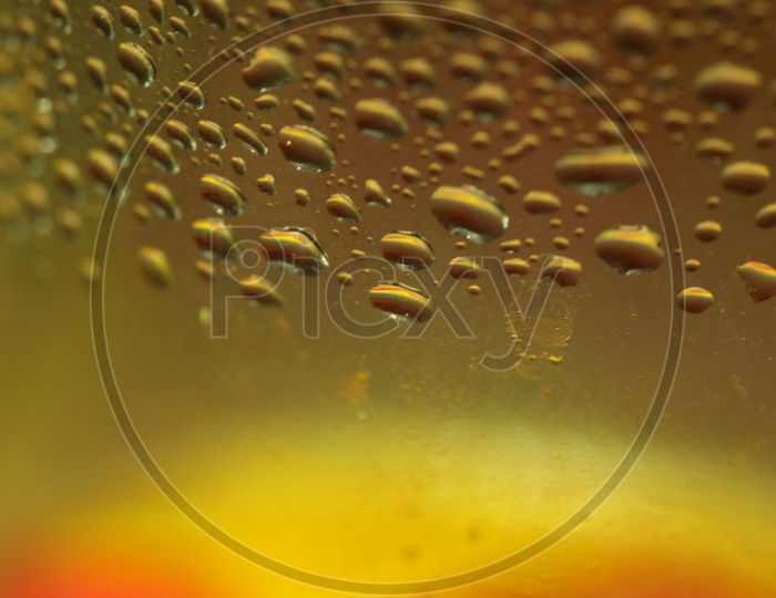 Yellow Water droplets abstract background