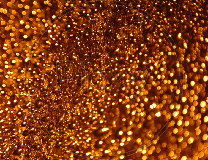 Water droplets gold abstract background