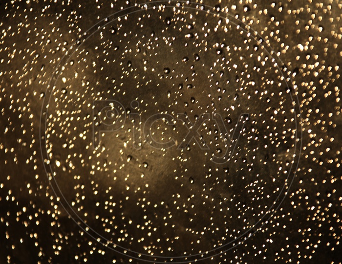 Water droplets dark abstract background