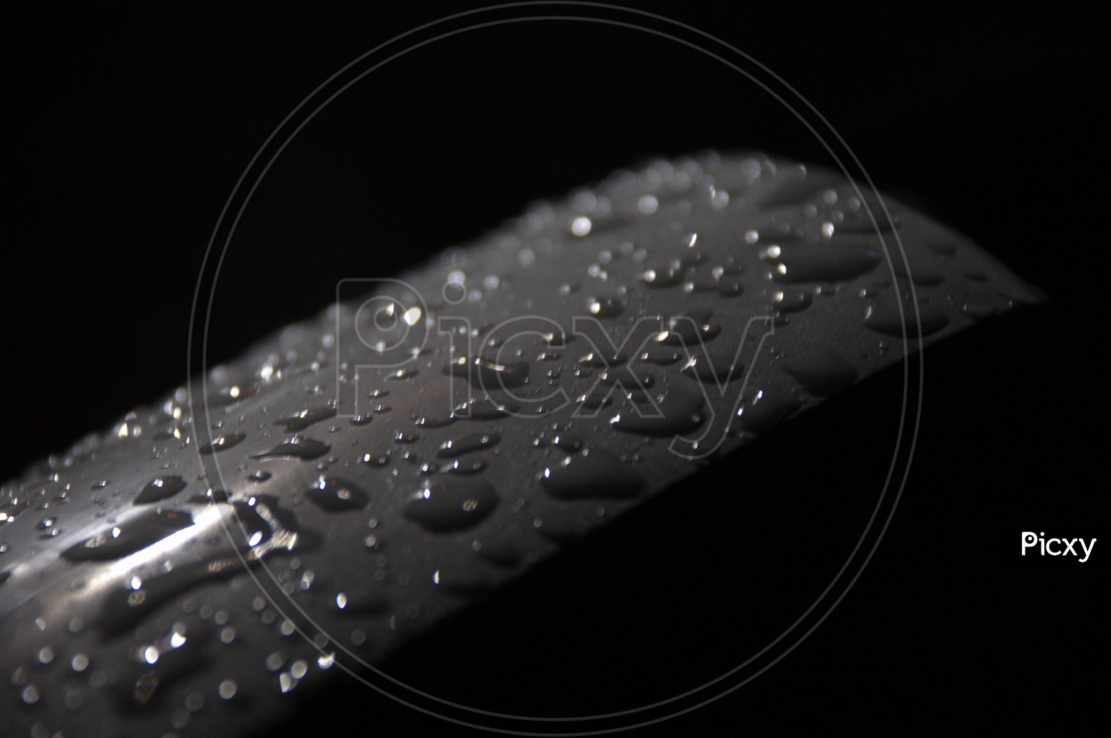 Water droplets grey and black abstract background
