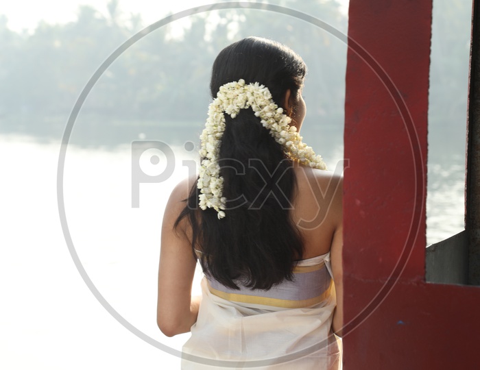 Kerala Girl Hair style With Flowers In Hair
