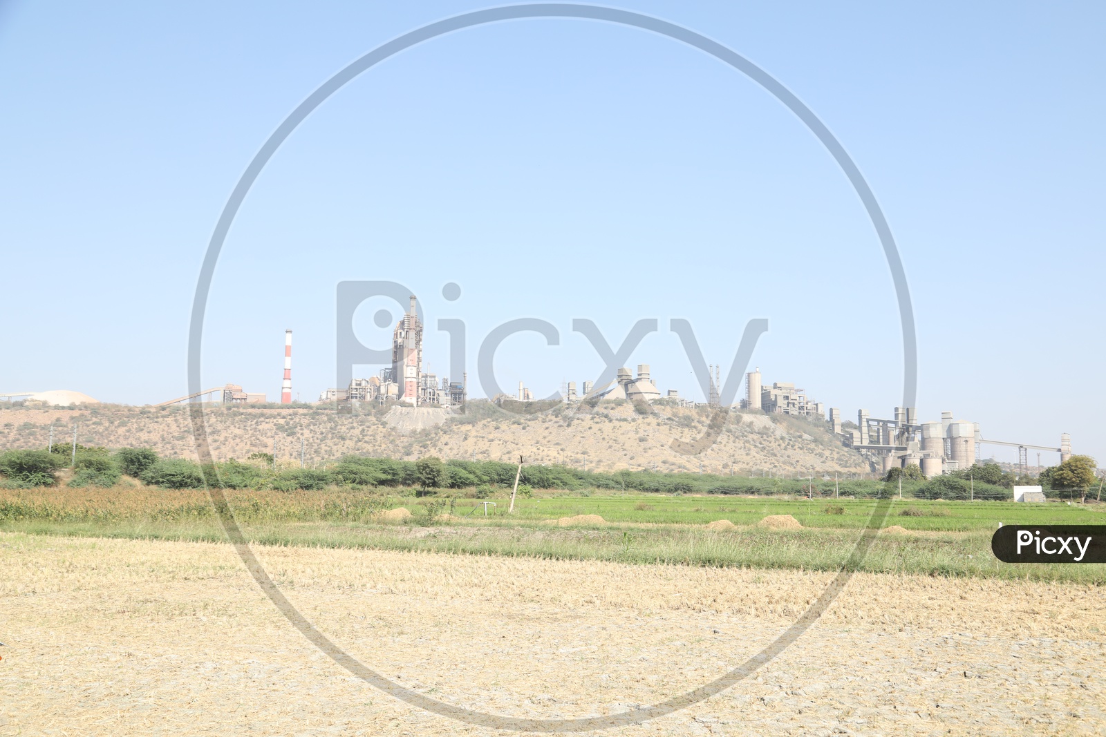 Thermal Power Plant With Paddy Fields Around the Factory