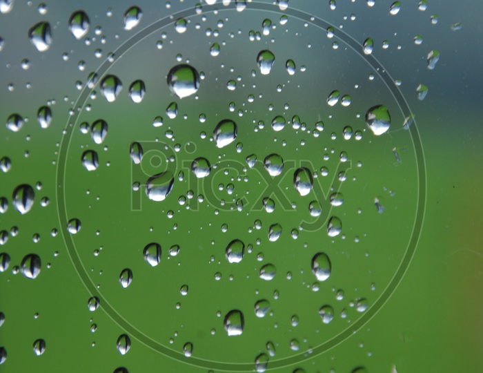 Water droplets on a glass surface abstract background