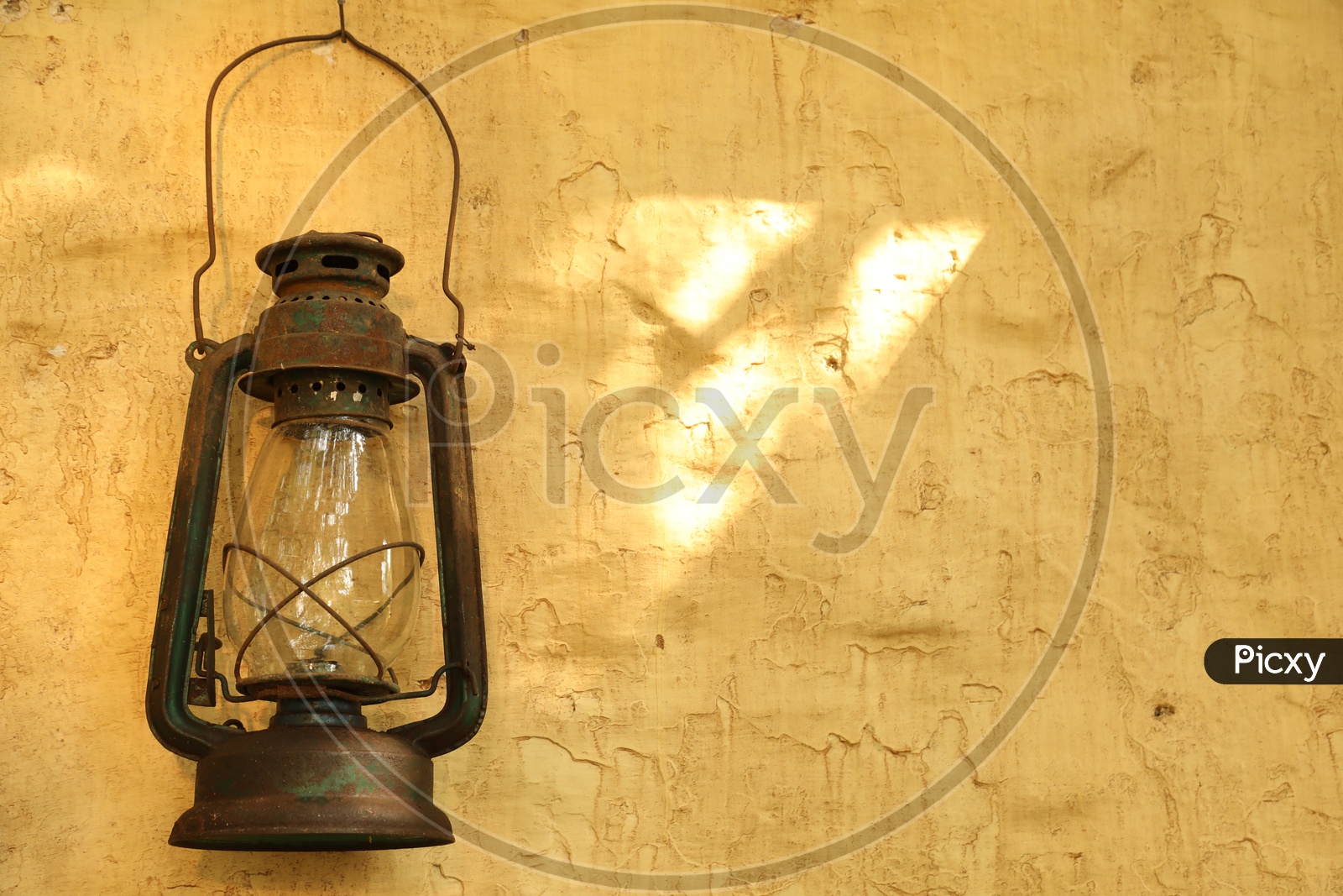Old Kerosene Lantern hung to the wall