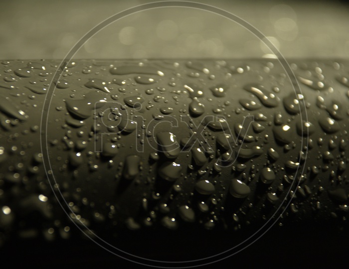 Water droplets grey abstract background
