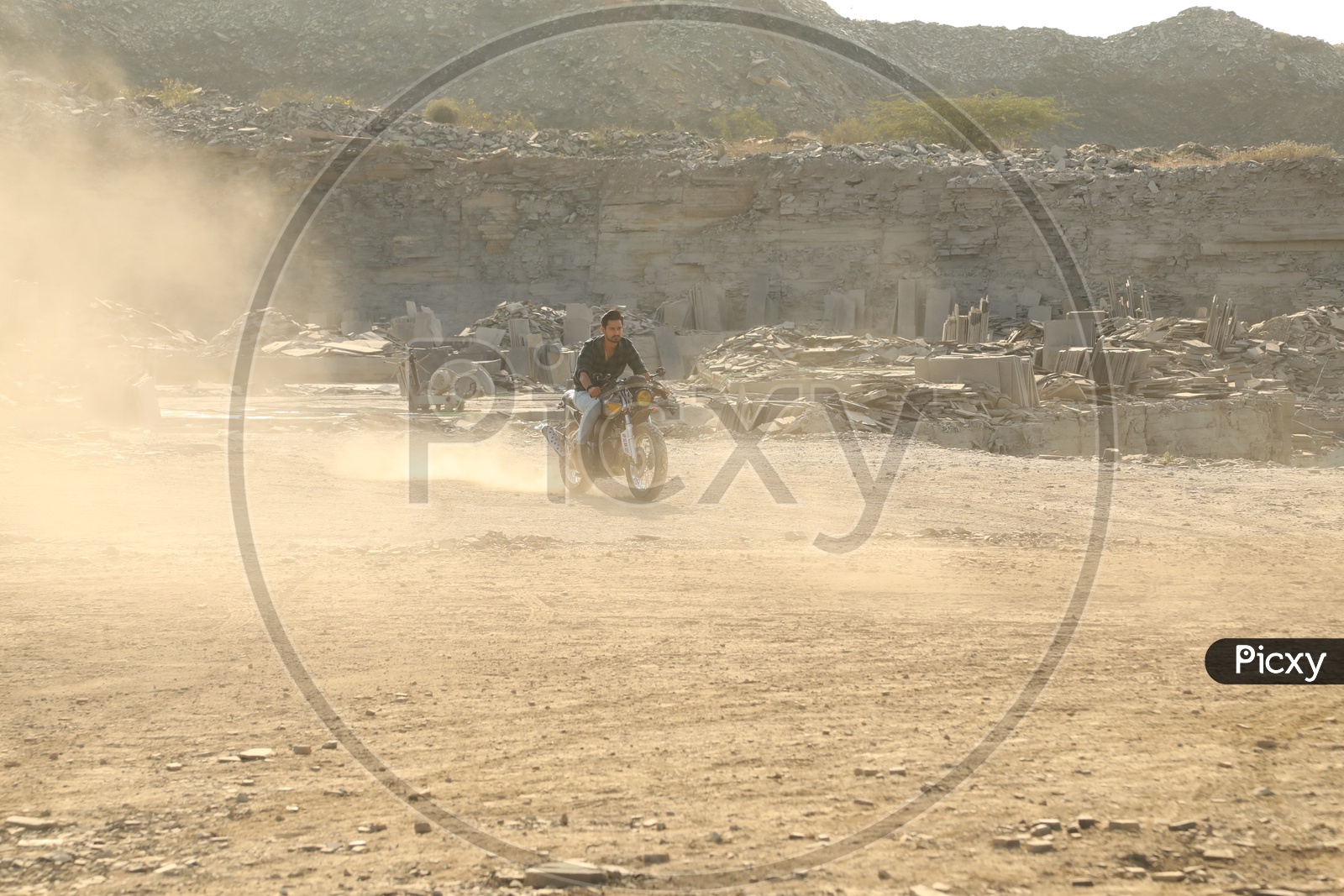 A man on the bike at Black stone mining area