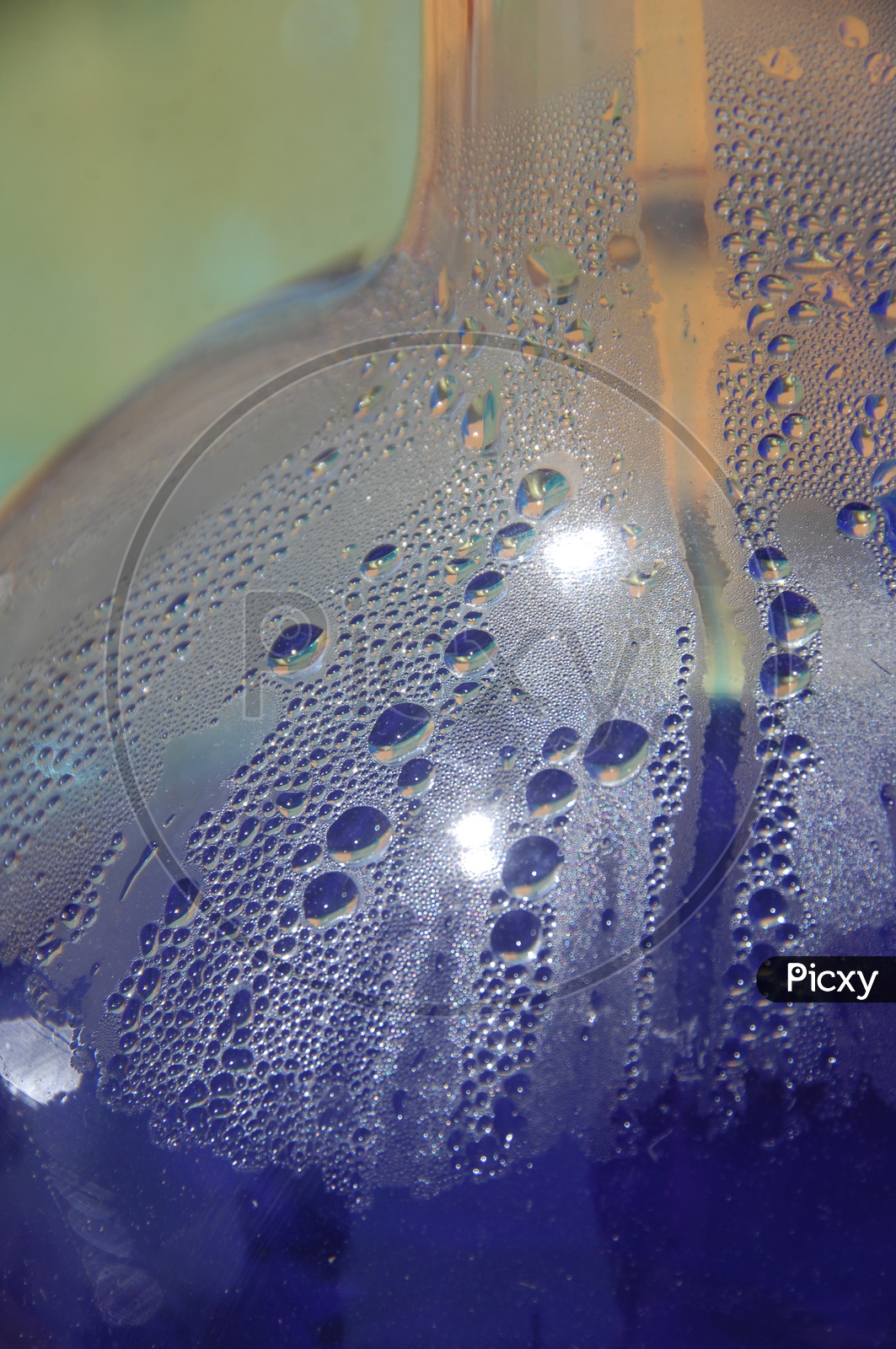 Water droplets inside a glass surface abstract background