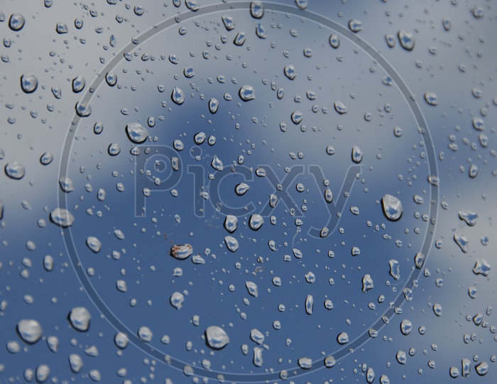 Water droplets light blue abstract background