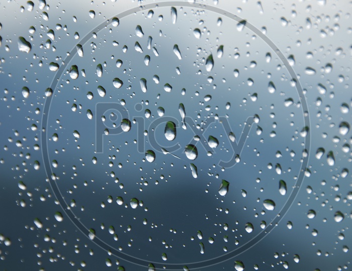 Water droplets on a glass Surface abstract background