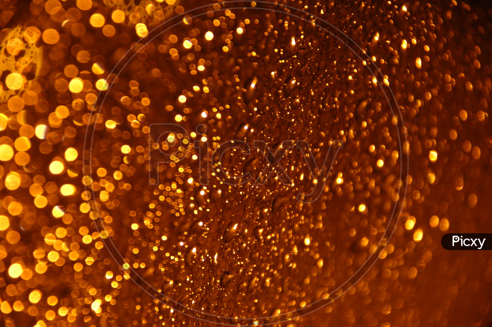 Water droplets golden yellow abstract background