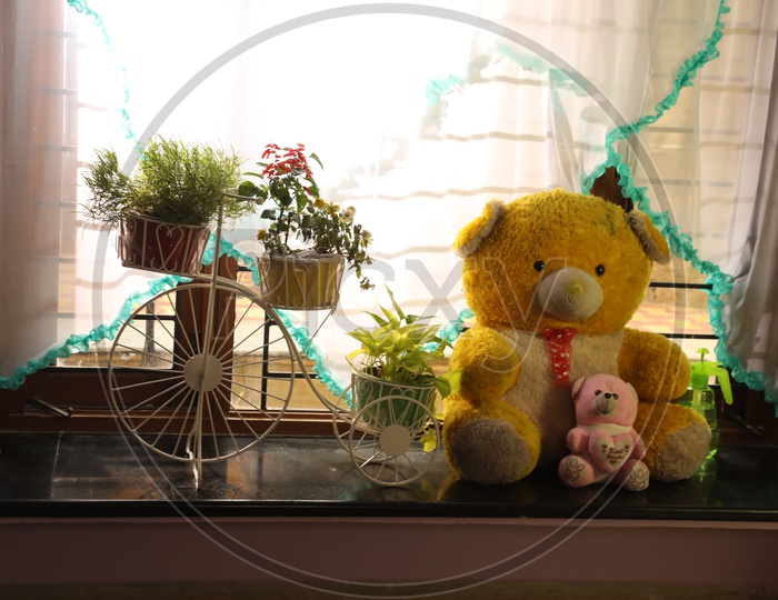 Teddy bears and tricycle planter