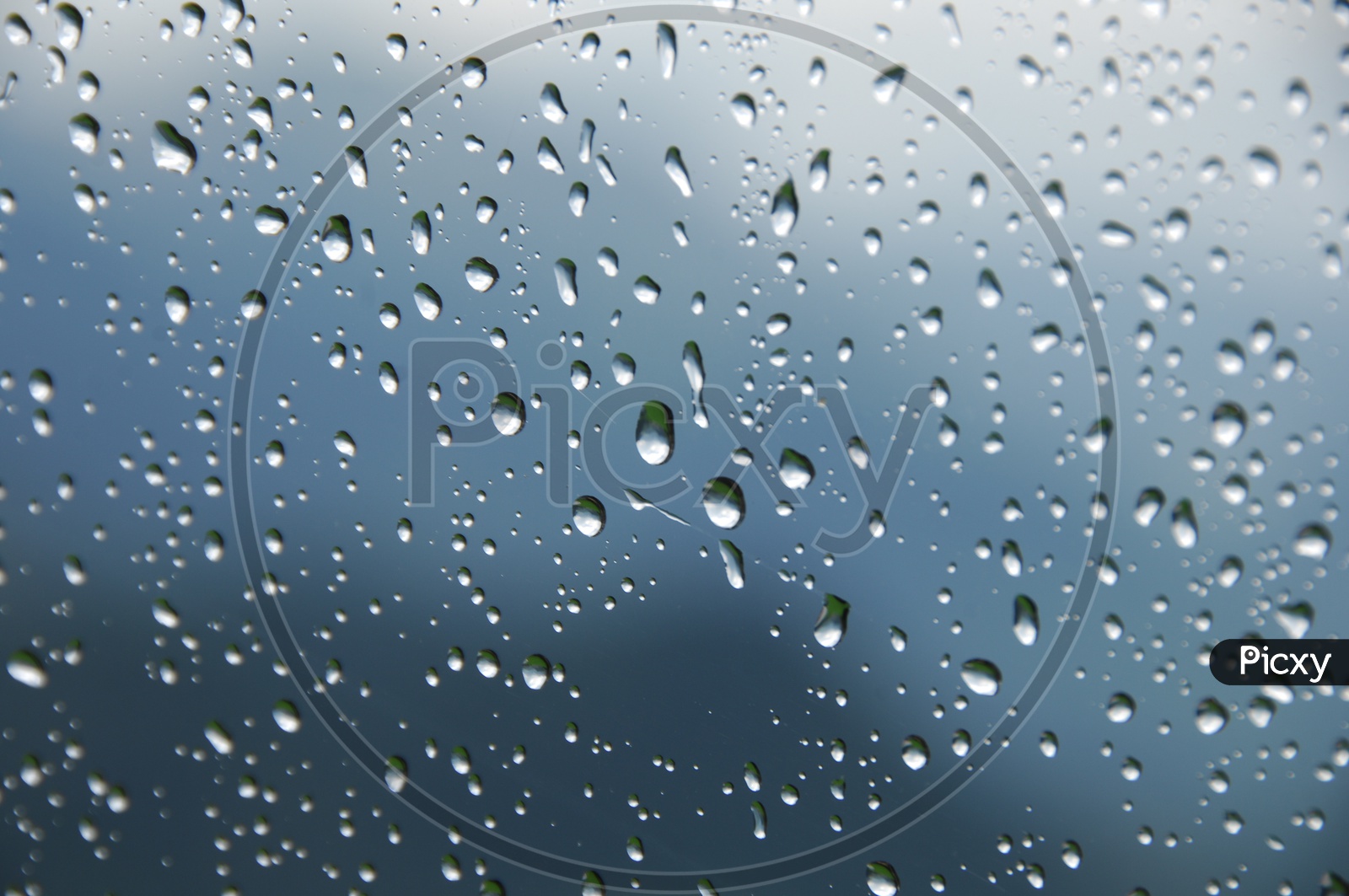 Water droplets on a glass Surface abstract background