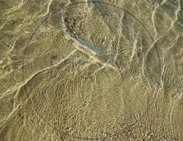 Transparent water on the sand