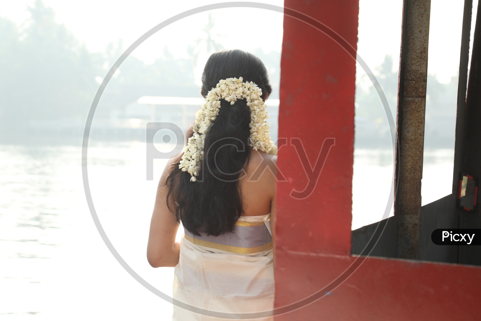 Kerala Girl Hair Style and Flowers In Hair