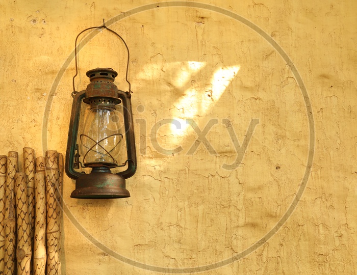 Old Lamp hanging to a wall