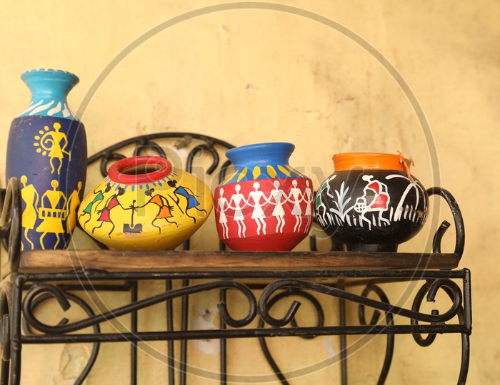Paint Design on Clay  Wash Vessel
