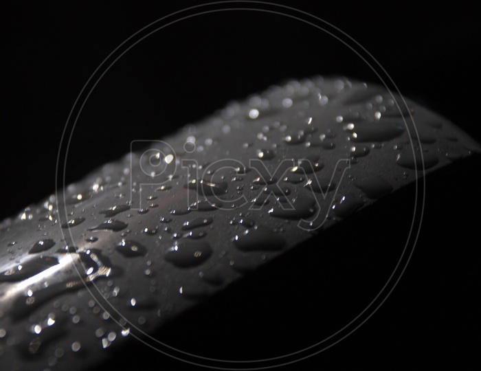 Water droplets grey and black abstract background