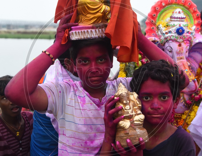 Kids with their Ganesha Idols during Ganesh Visarjan