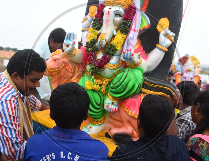 Men carrying the Ganesha Idol during the Ganesh Visarjan